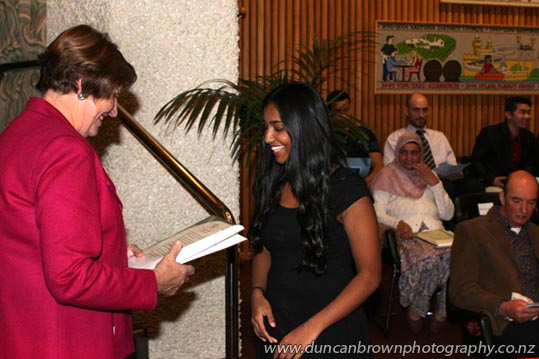 Deputy-mayor Cynthia Bowers presents New Zealand Citizenship to Jeriel Sajan, from Hastings. photograph