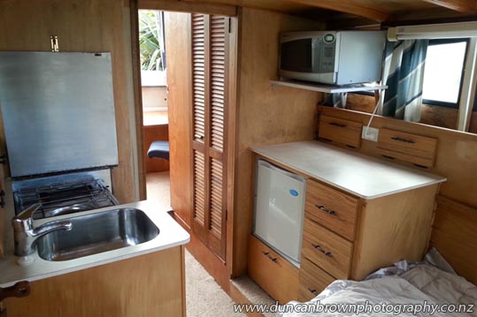 Holiday accommodation - Got family coming for the holidays? They could try something a bit different - and inexpensive - with this 30-foot self-contained boat on a peaceful rural property, just minutes from both Hastings and Havelock North. photograph
